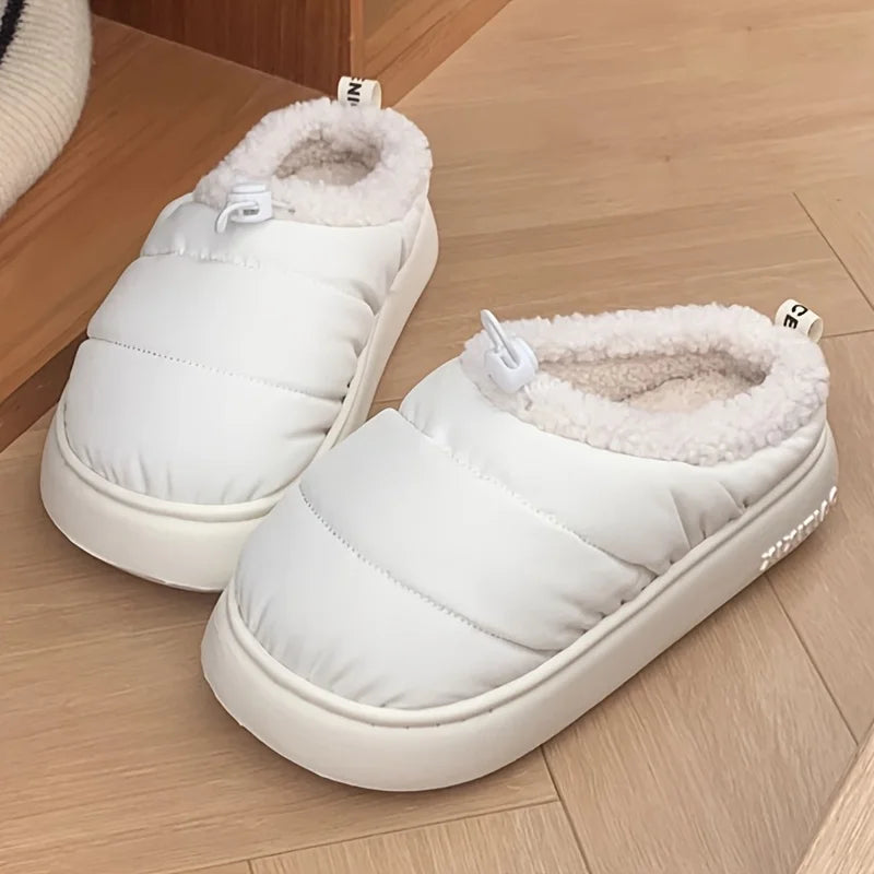 Cozy fuzzy winter slippers for women and men with soft EVA sole warm fabric lining indoor outdoor use casual style drawstring