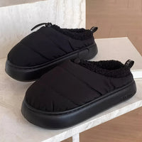 Cozy fuzzy winter slippers for women and men with soft EVA sole warm fabric lining indoor outdoor use casual style drawstring