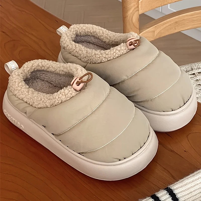 Cozy fuzzy winter slippers for women and men with soft EVA sole warm fabric lining indoor outdoor use casual style drawstring