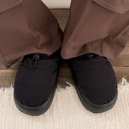 Cozy fuzzy winter slippers for women and men with soft EVA sole warm fabric lining indoor outdoor use casual style drawstring