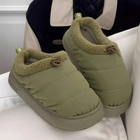 Cozy fuzzy winter slippers for women and men with soft EVA sole warm fabric lining indoor outdoor use casual style drawstring